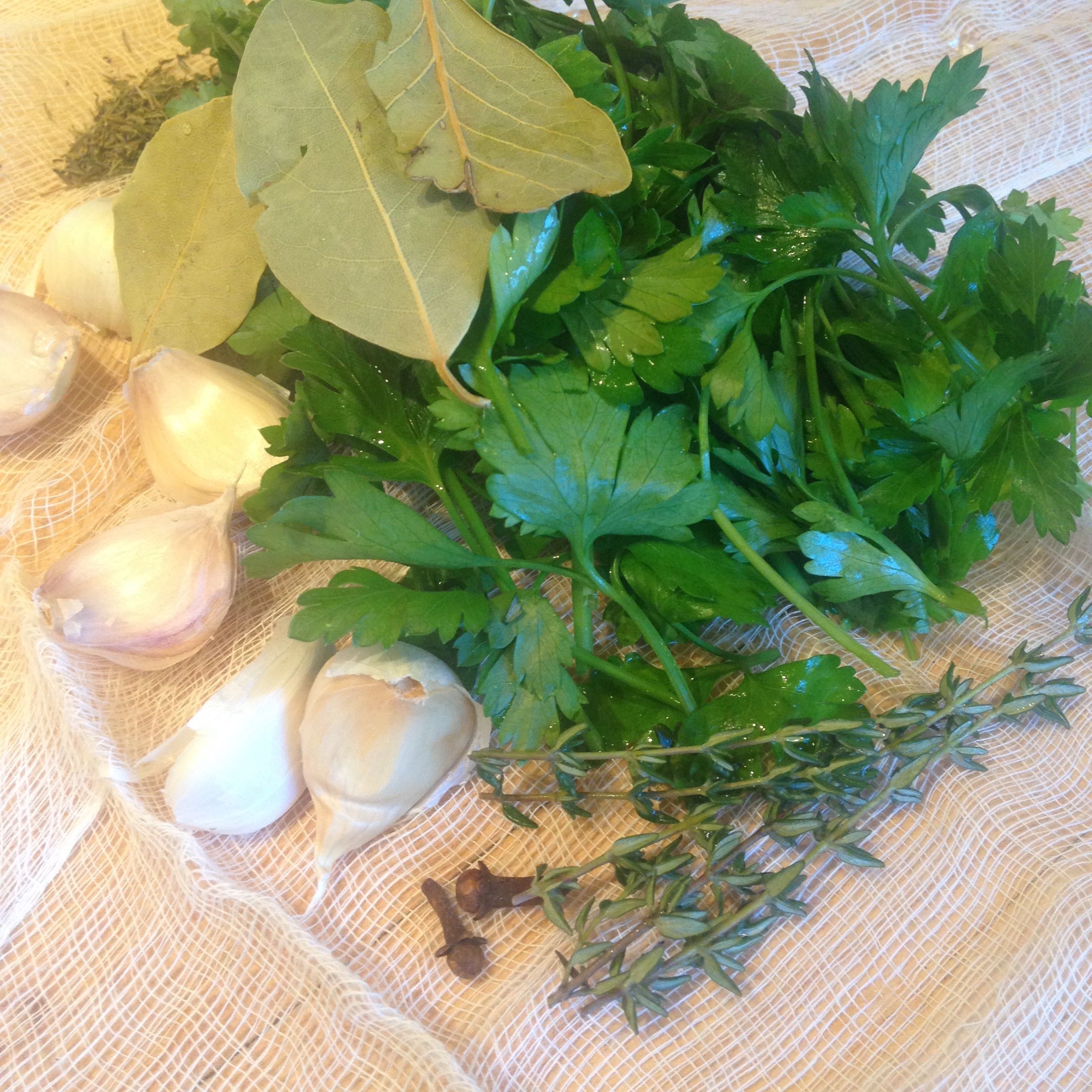 The bouquet garni for the beans is pretty important. Parsley, thyme, garlic and bay flavor the beans. 